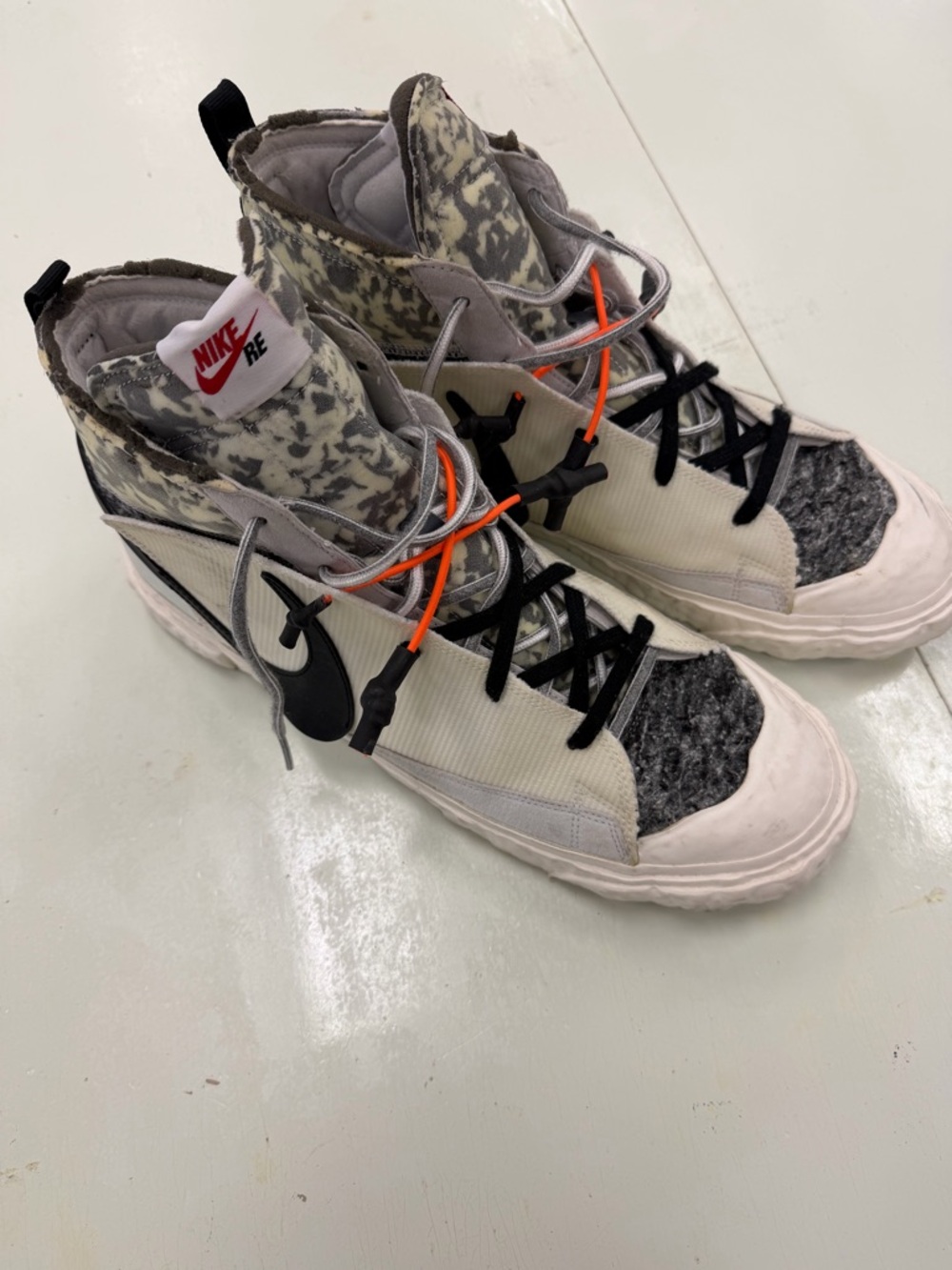 Nike Men’s High-Top Sneakers in Black, Gray, White with Orange Accents